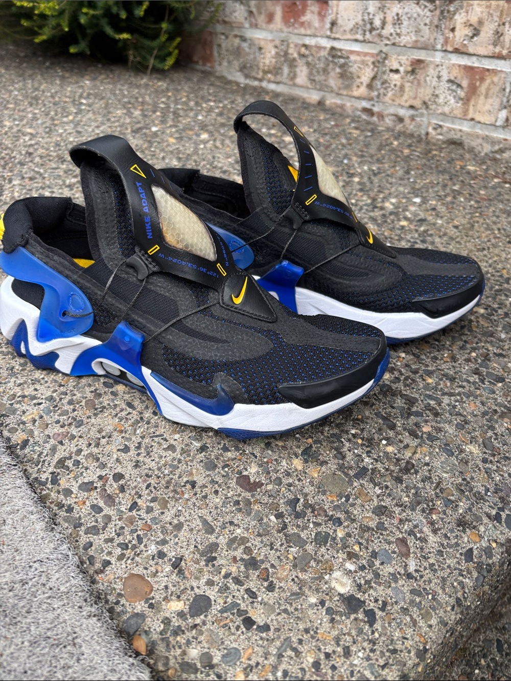 Nike Black and Blue Slip-On Performance Sneakers with Yellow Accents